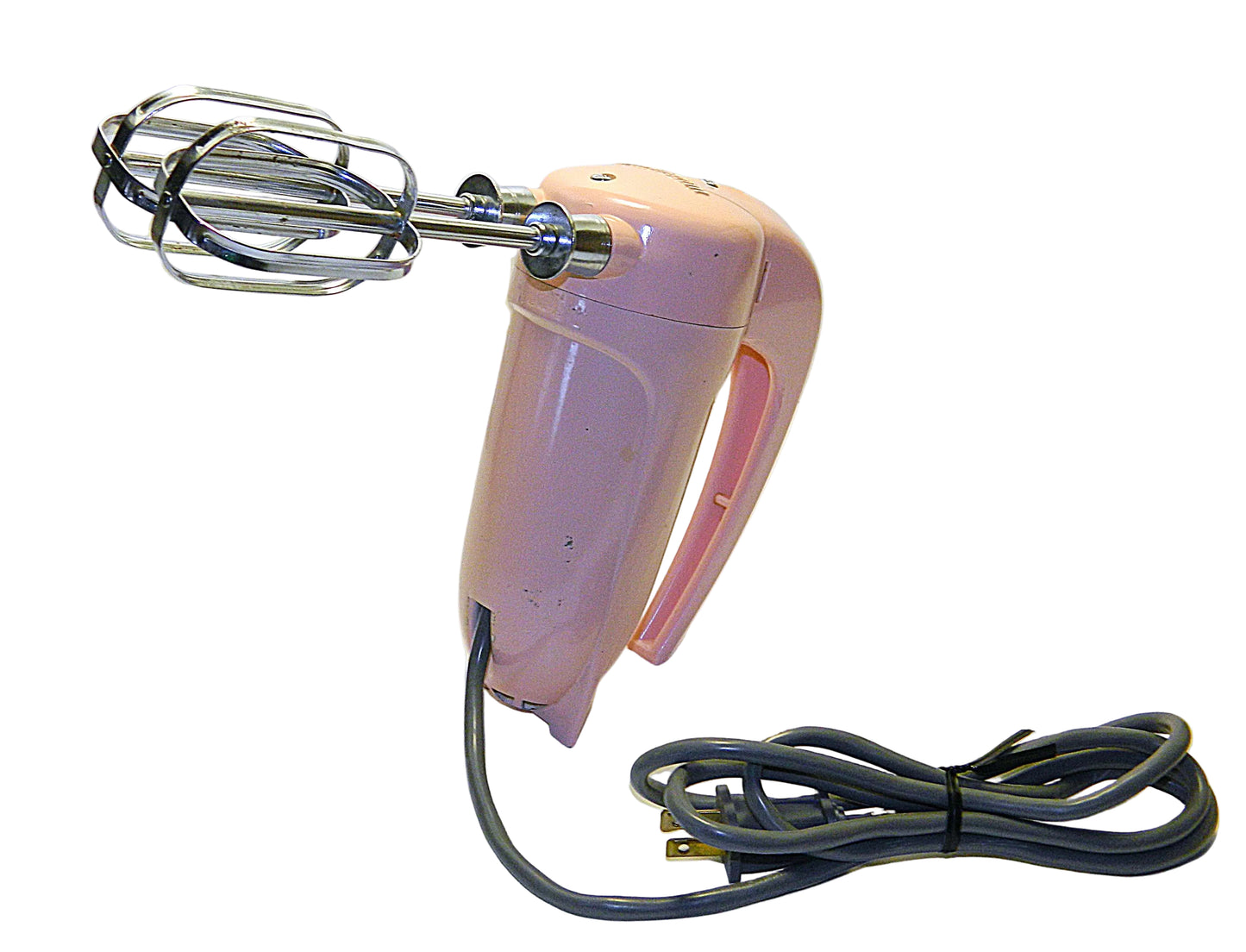 Pink hand mixer with whisk attachment on a white background