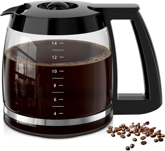 Black coffee maker with glass carafe filled with coffee and coffee beans on a white background