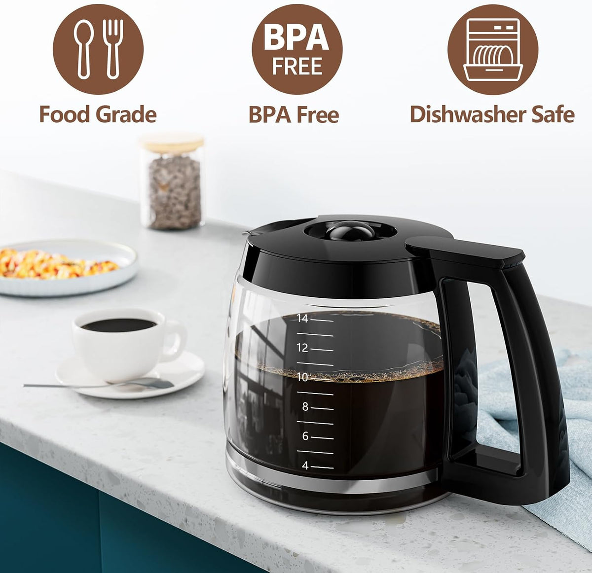Black glass coffee maker on a kitchen counter with BPA-free and food-grade labels.