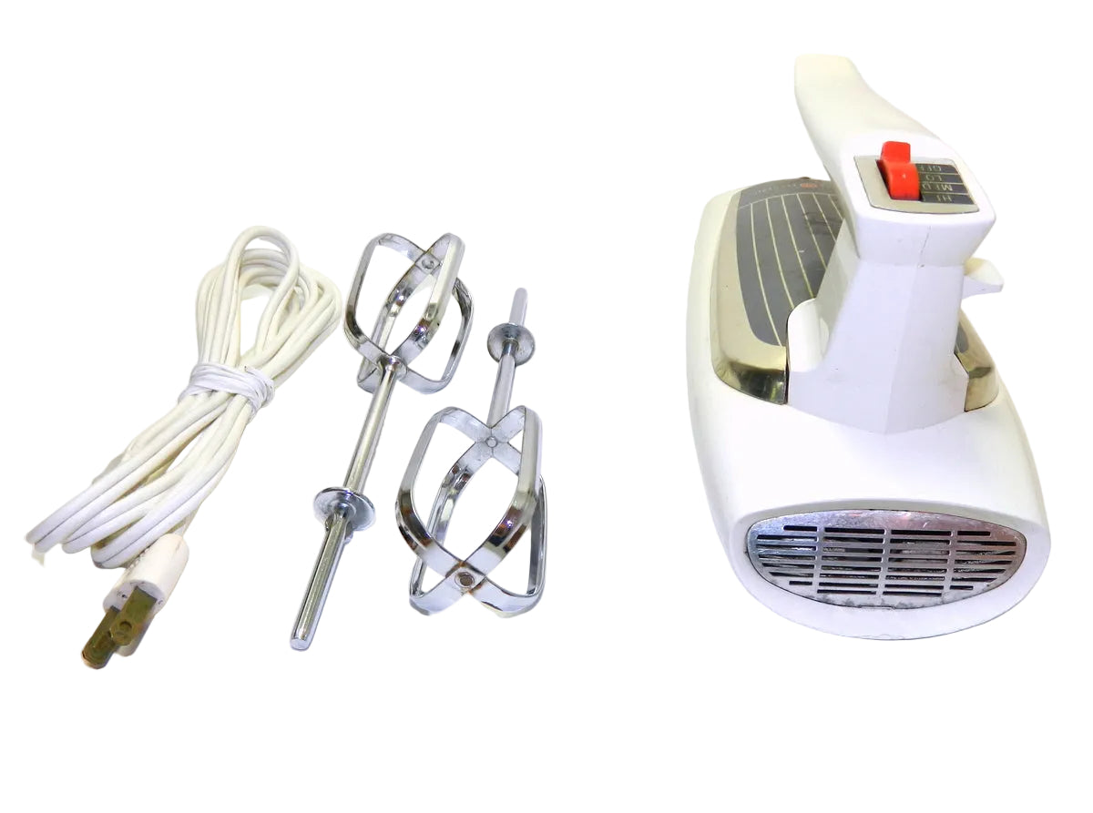 Handheld electric mixer with attachments on a white background