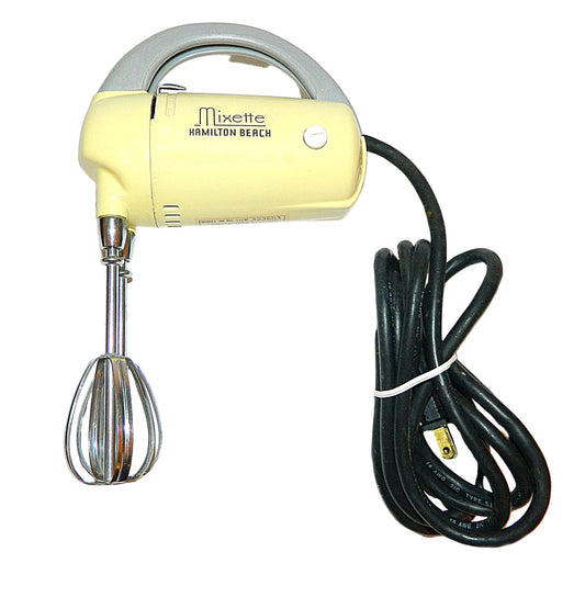 Yellow Hamilton Beach hand mixer on a white background