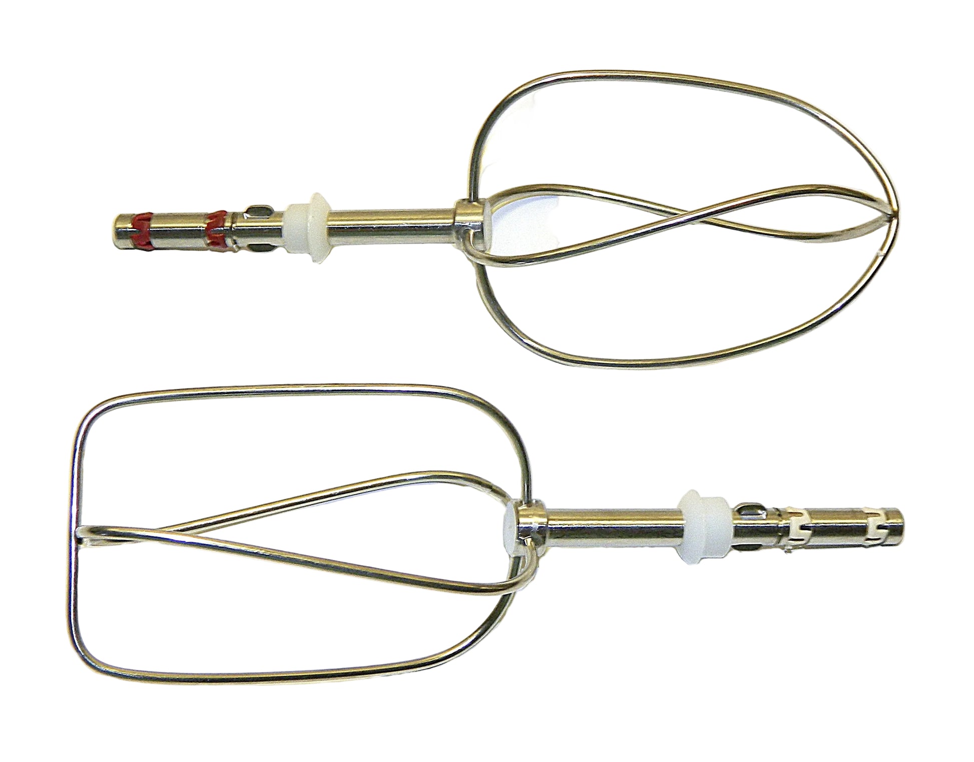 Two metal mixing beaters on a white background