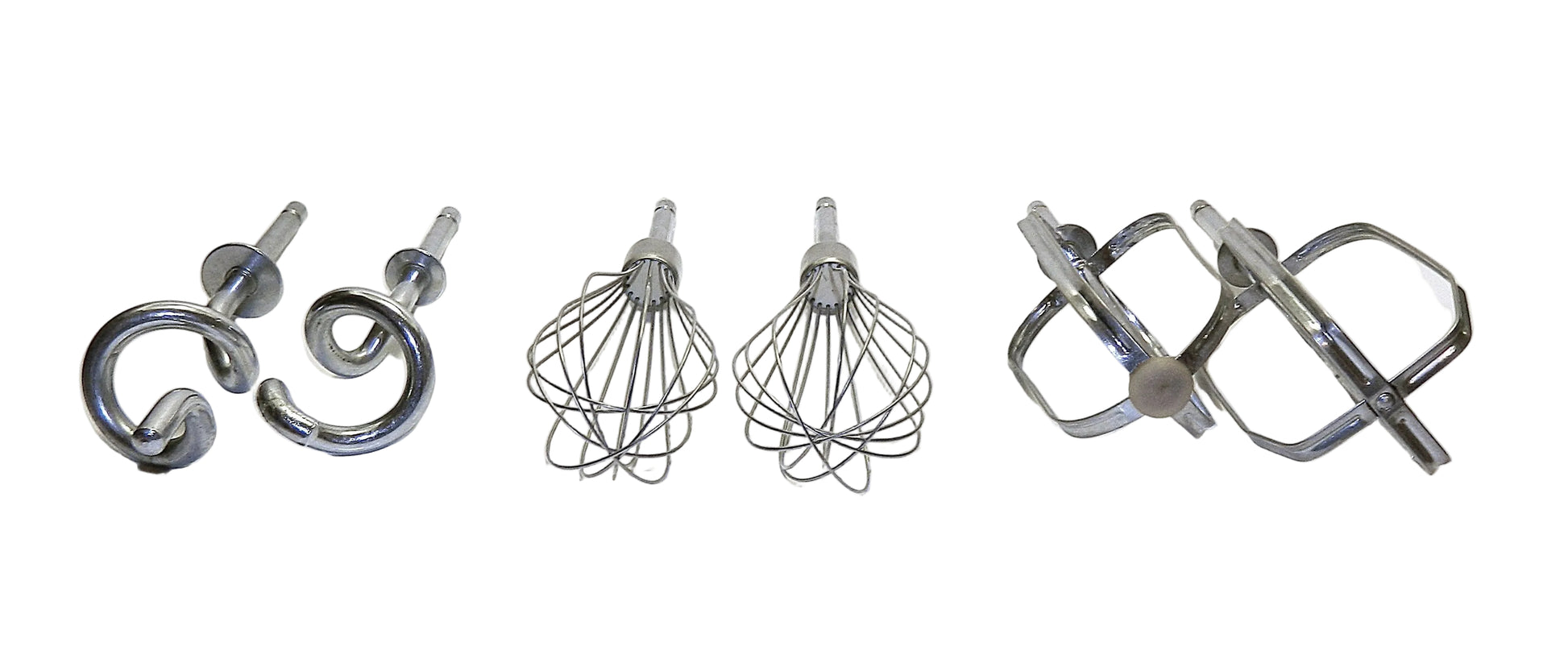 Set of metal kitchen attachments including a beater, whisk, and dough hook on a white background