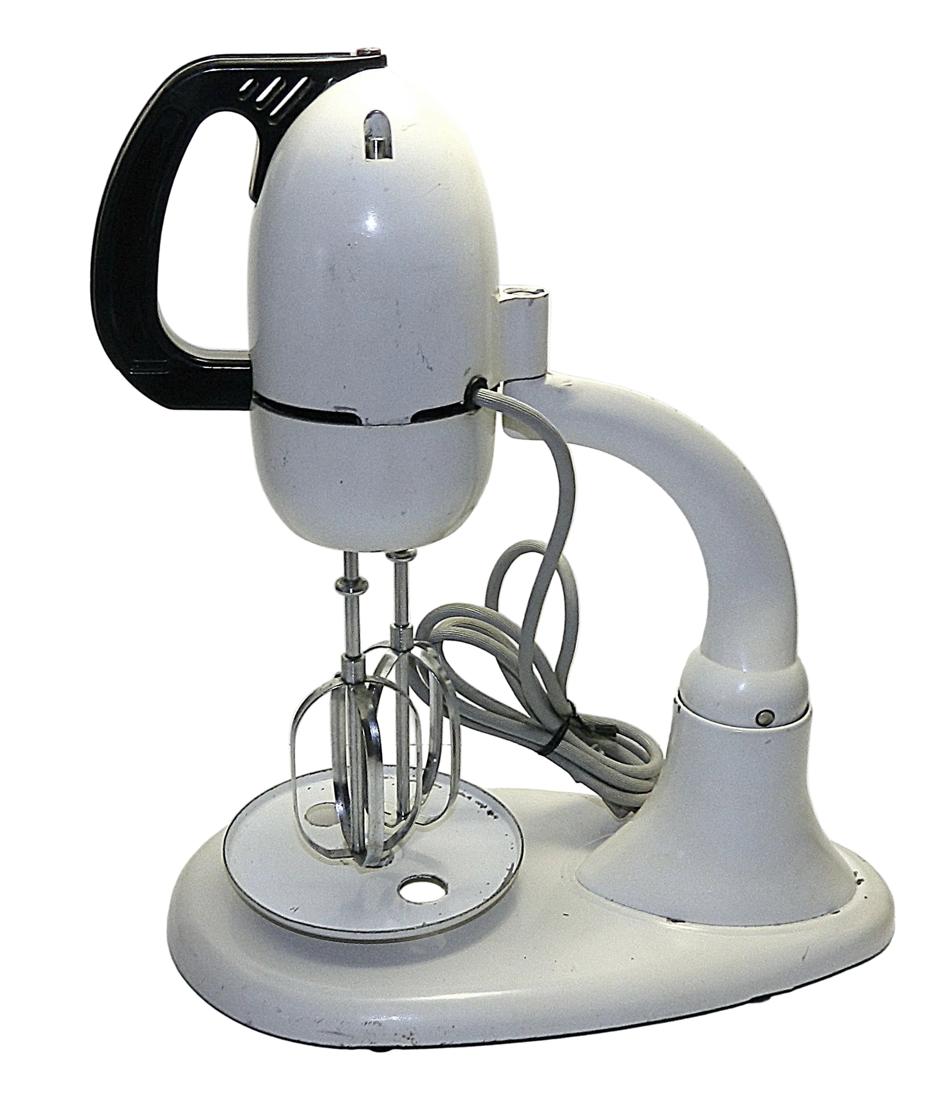 Vintage electric mixer on a white background