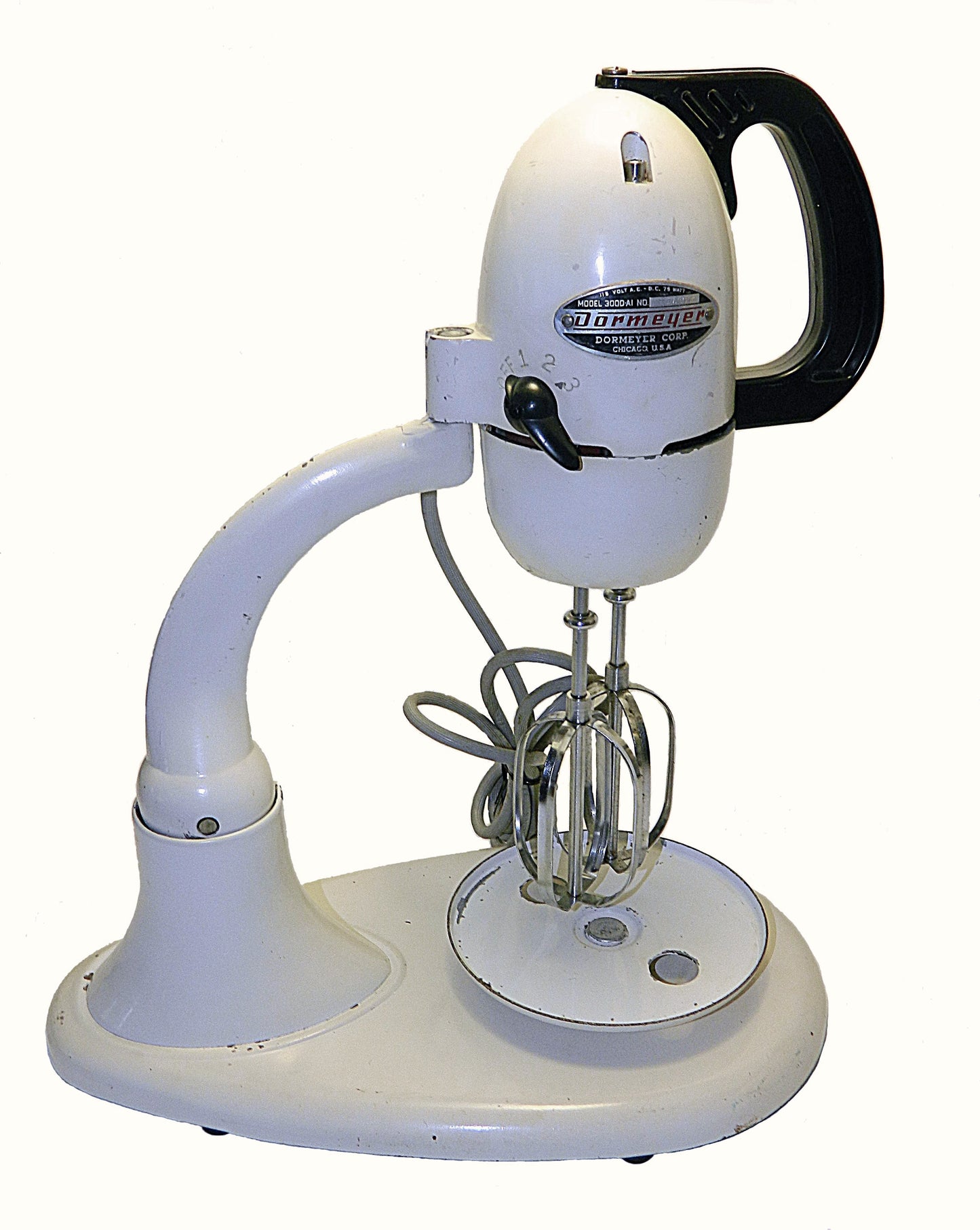 Vintage white stand mixer with black handle on a white background