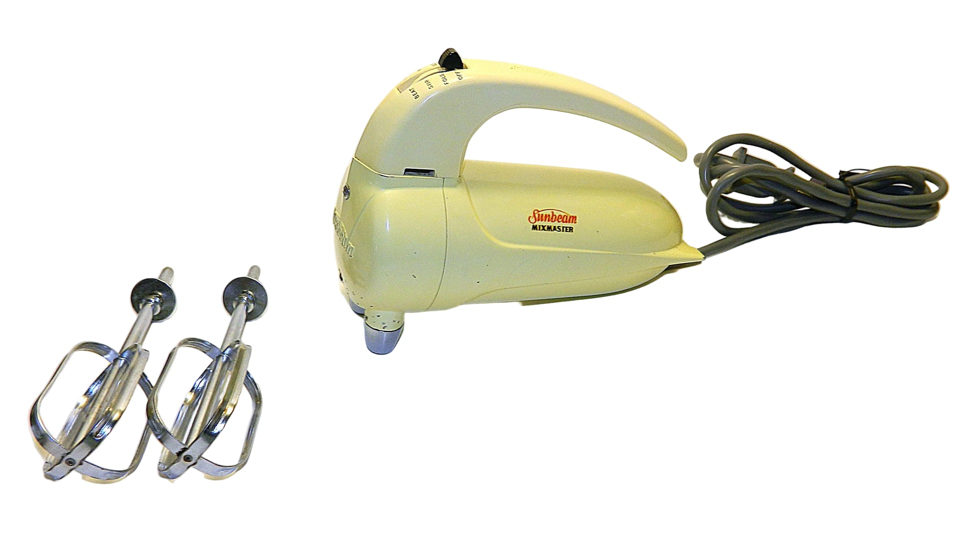 Vintage kitchen mixer with attachments on a white background
