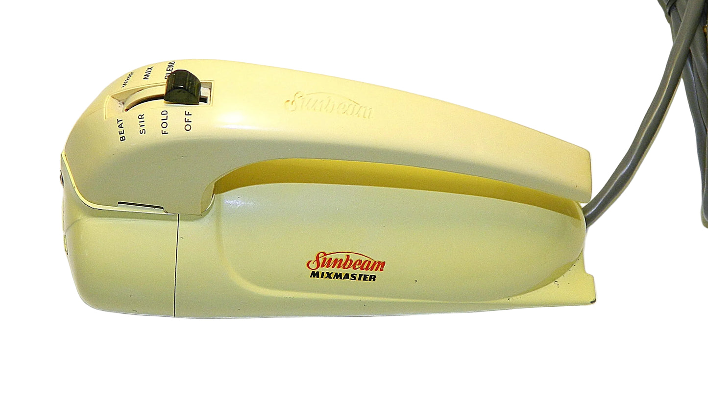 Yellow Sunbeam mixer on a white background