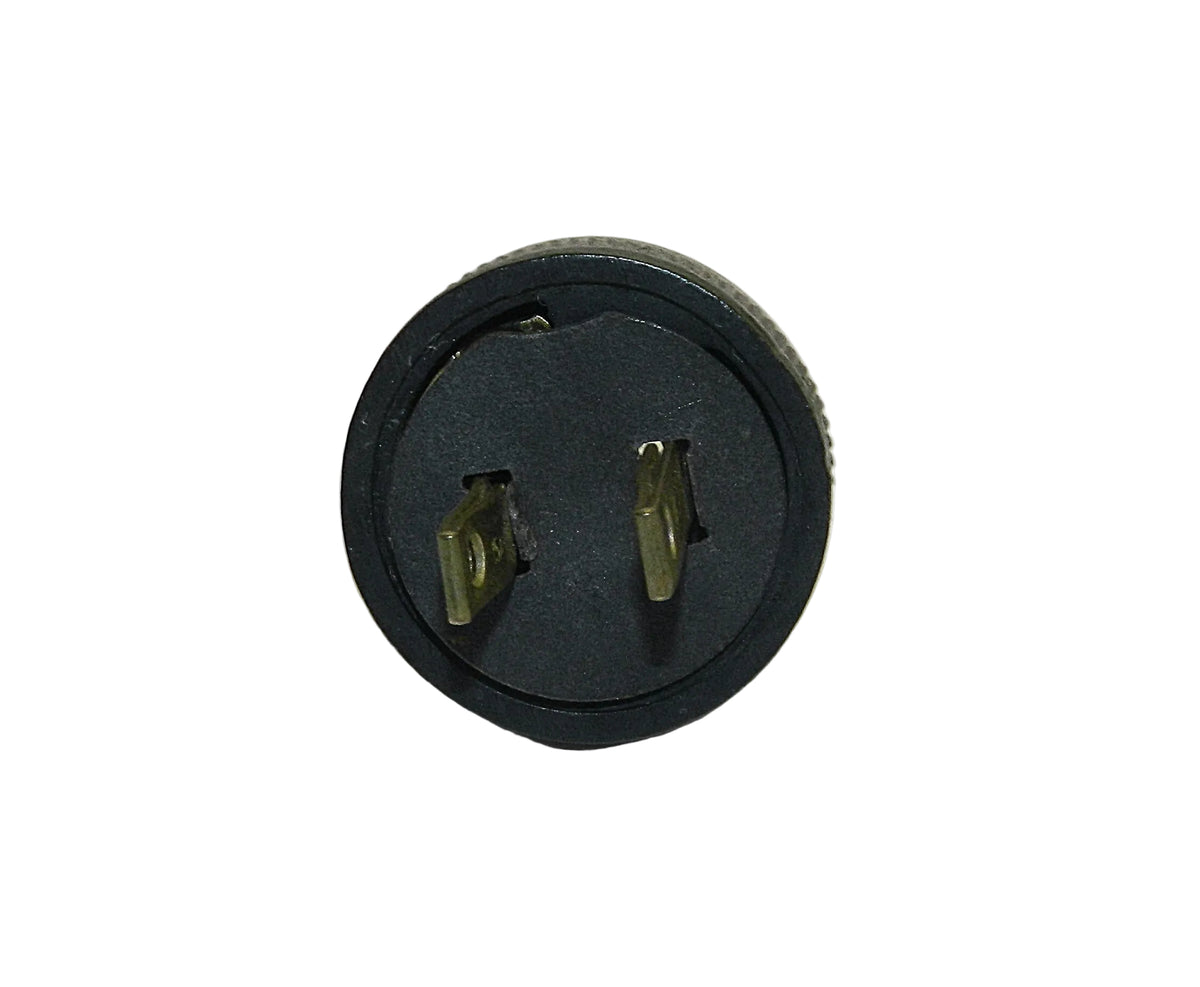 A black circular electrical outlet adapter with two gold-toned metal prongs, photographed on a plain white background.