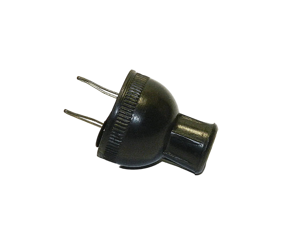 A small black plastic electrical plug adapter with two metal pins, shown on a plain white background.