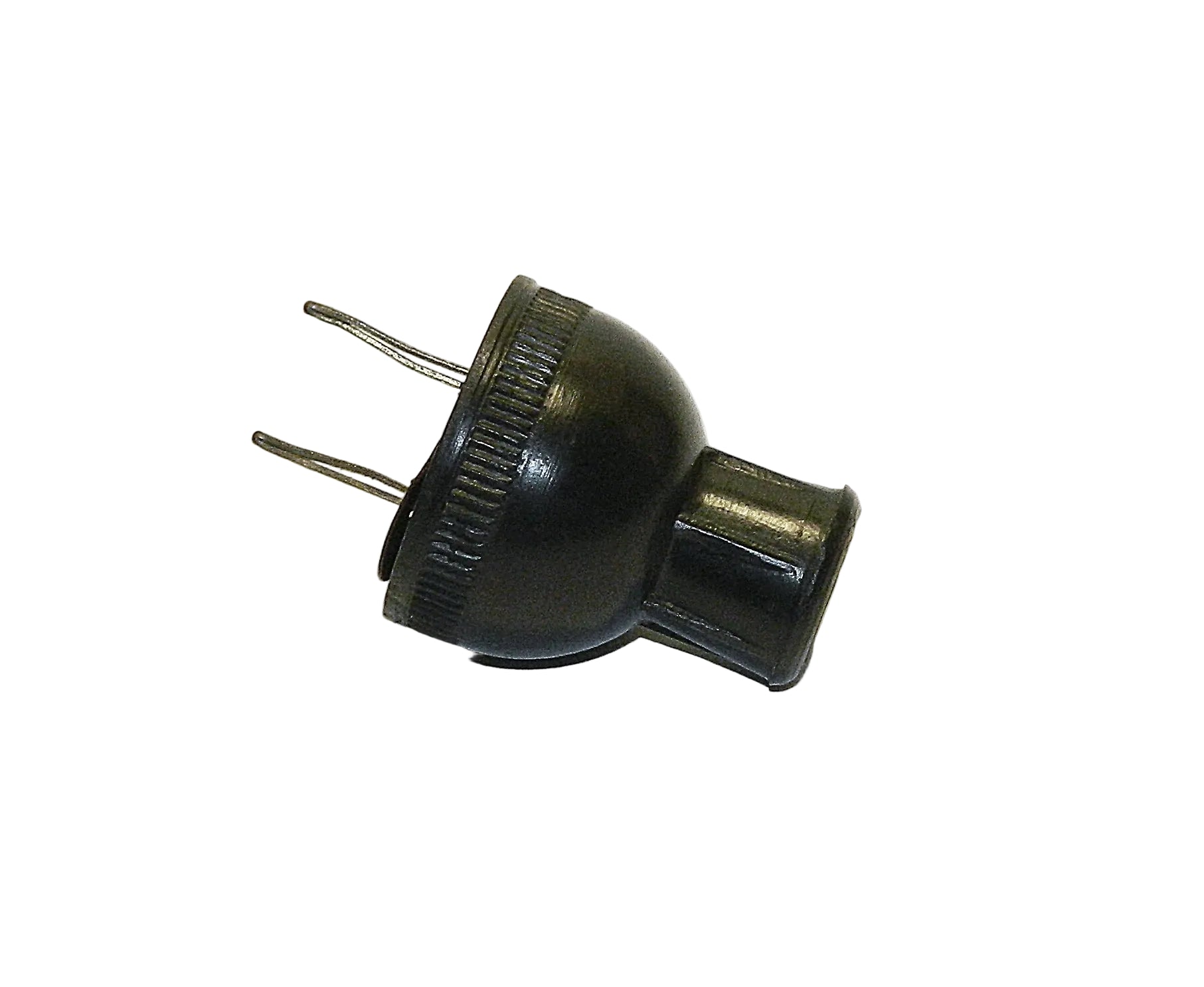A small black plastic electrical plug adapter with two metal pins, shown on a plain white background.
