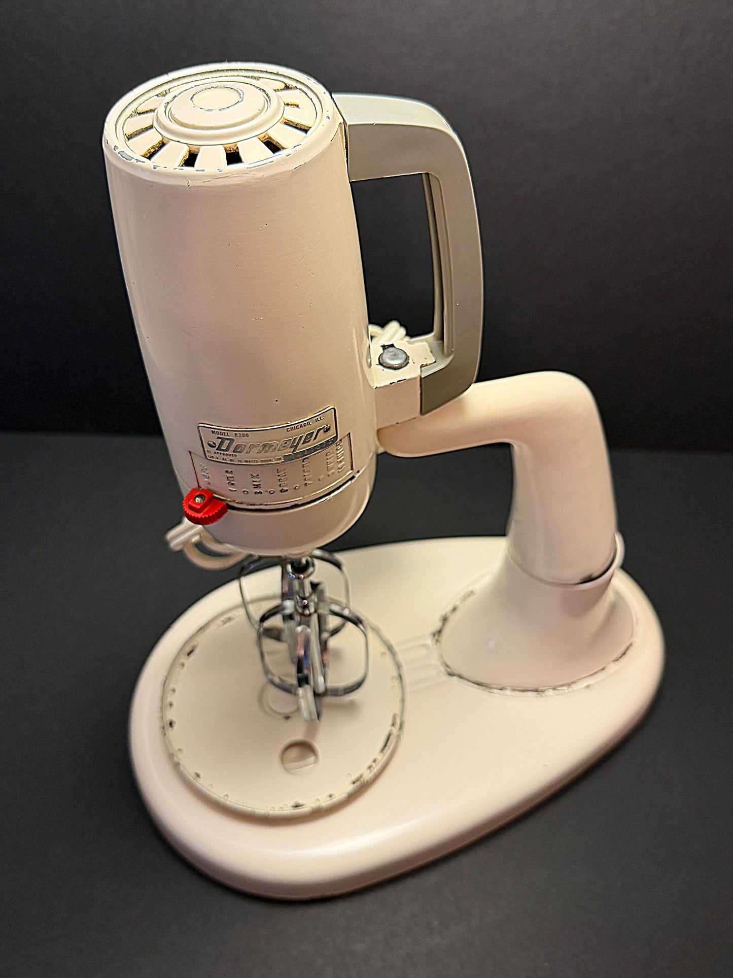 Vintage stand mixer on a dark background