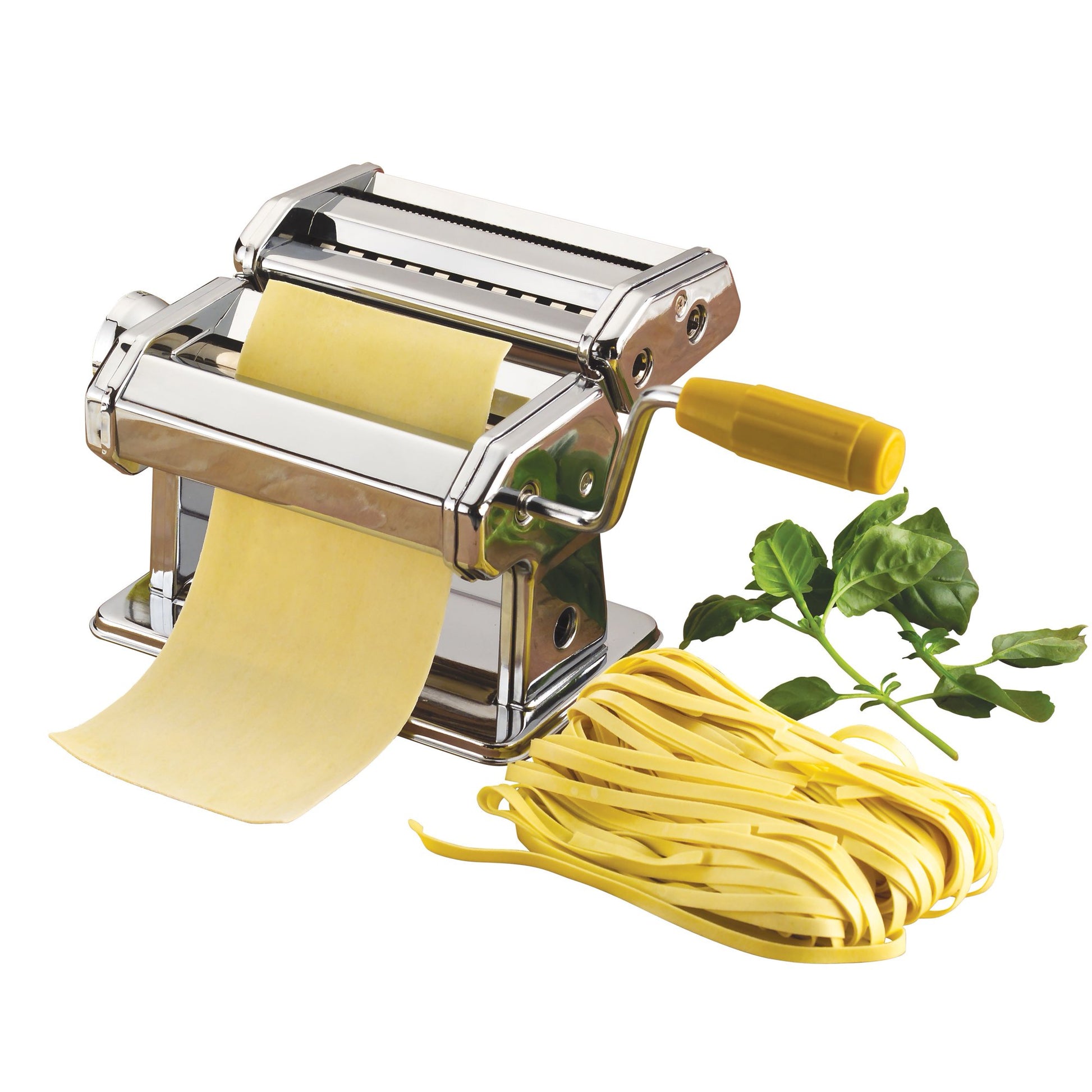 Pasta maker with fresh pasta and basil on a white background
